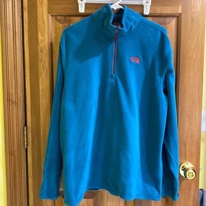 North face men’s 1/4 zip fleece.  Large/blueish teal colored